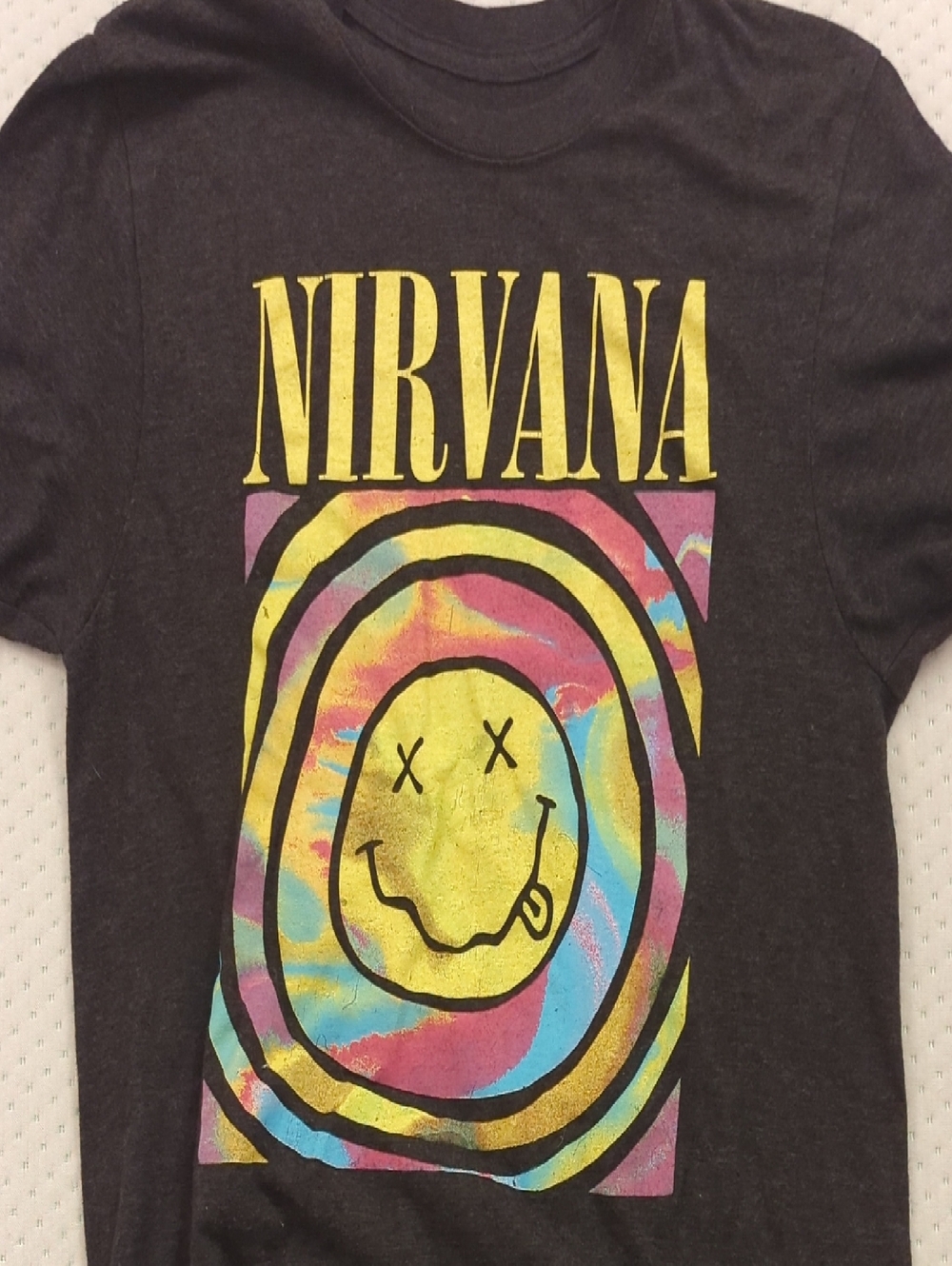 NIRVANA Black Tee with Yellow Logo and Multicolor Tie-Dye Smile